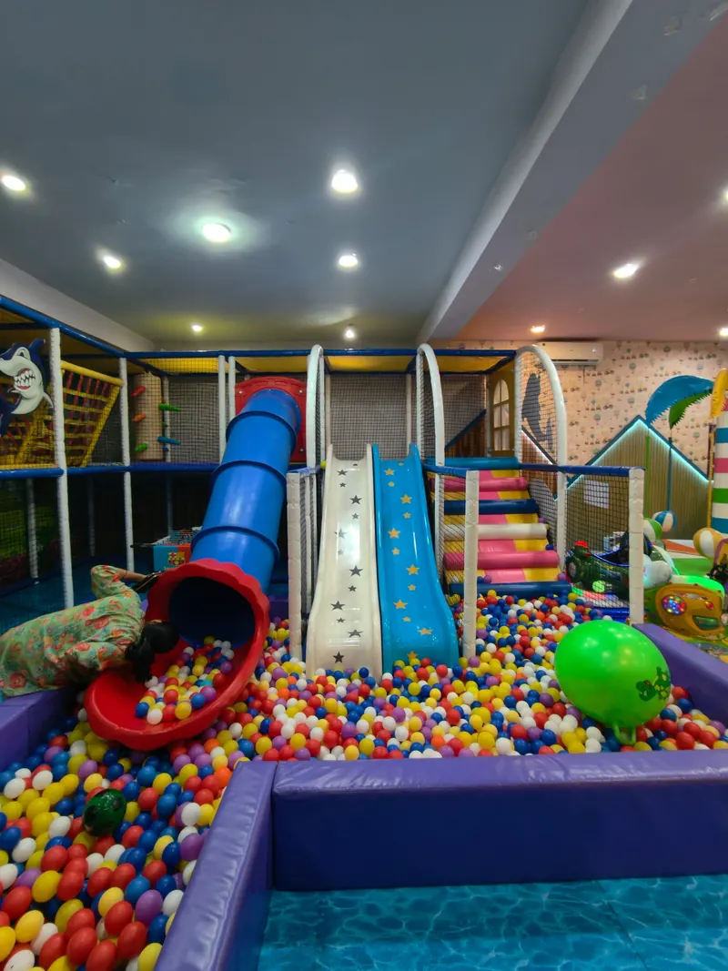 Children's ride and play area at Rainbow Kids Zone